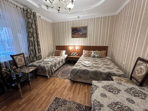 Classic Quadruple Room | Premium bedding, desk, laptop workspace, blackout drapes - Sarbon Hotel (Tashkent)