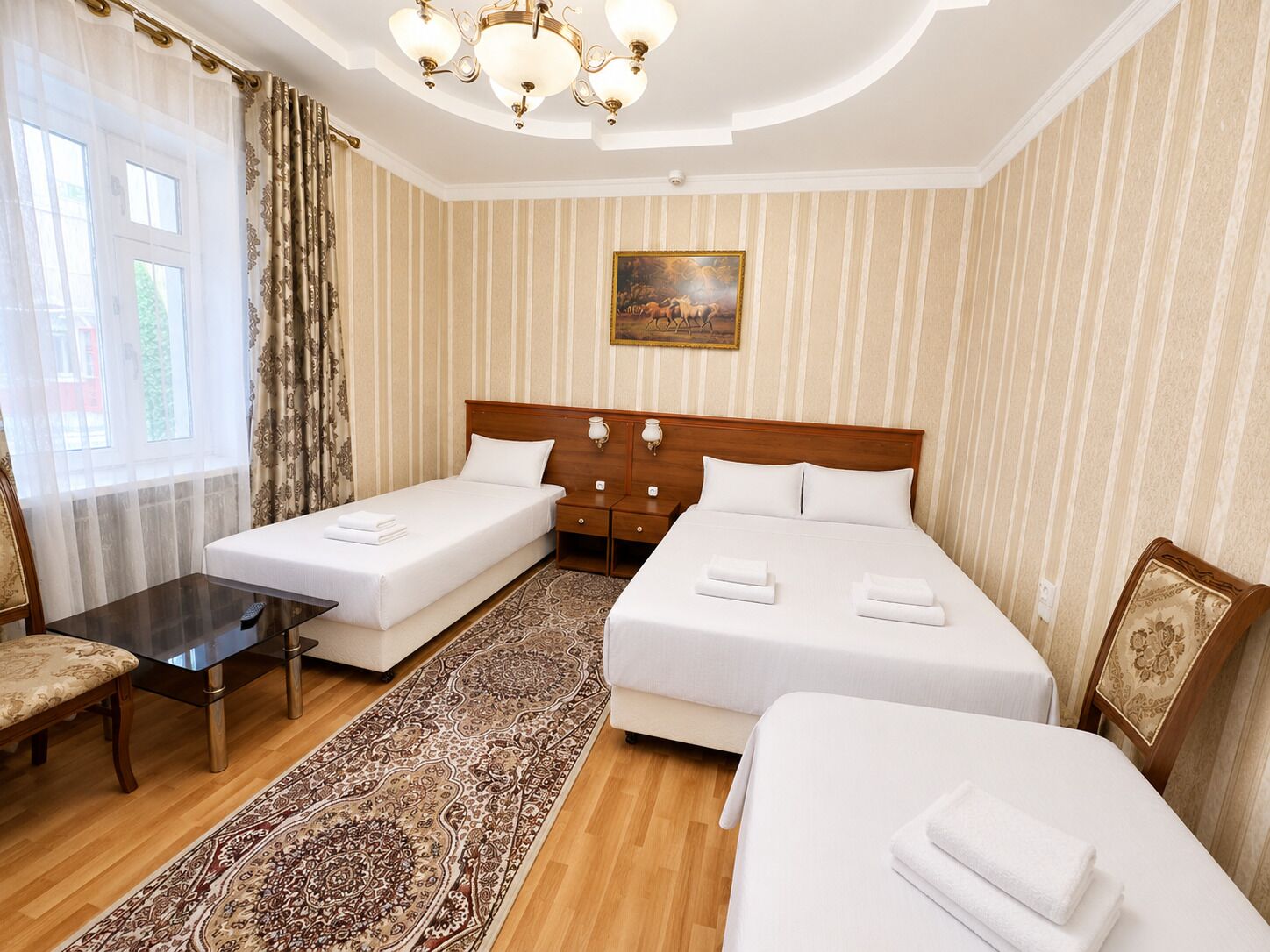 Standard Quadruple Room | Premium bedding, desk, laptop workspace, blackout drapes
