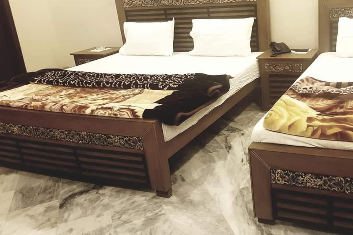 Comfort Room, Multiple Beds, Non Smoking, City View | Iron/ironing board, free WiFi
