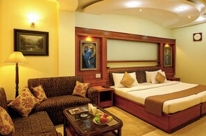 Super Deluxe Room | Premium bedding, desk, laptop workspace, blackout drapes - Hotel TJS Royale (New Delhi)
