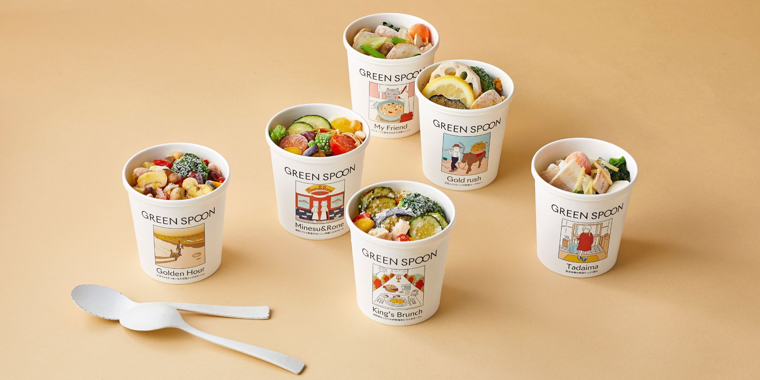 Seven cups of food with different labels, each containing various fruits and vegetables.
