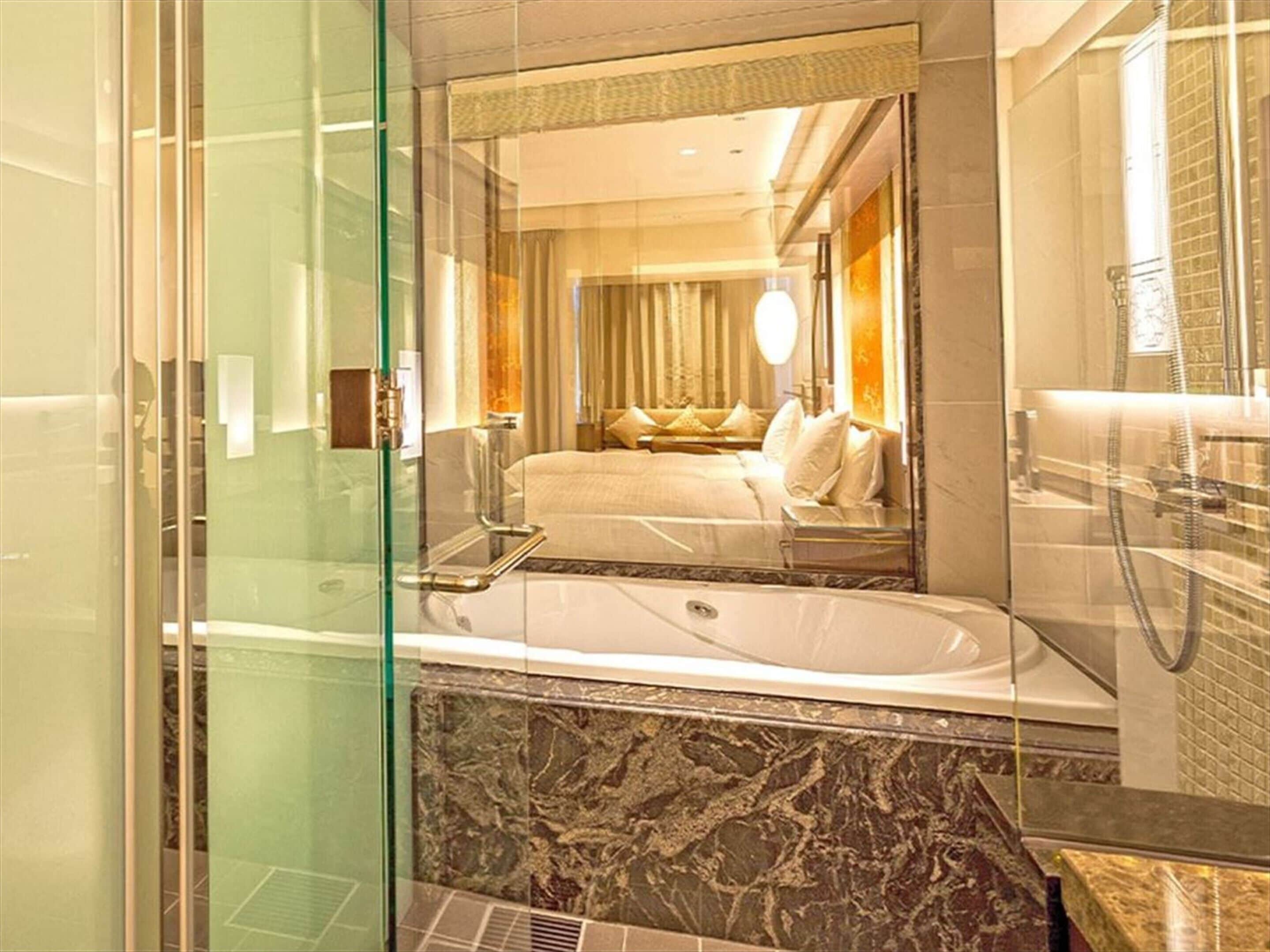 separate bathtub and shower, deep-soaking bathtub, free toiletries