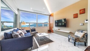 Suite | Area soggiorno | TV a schermo piatto