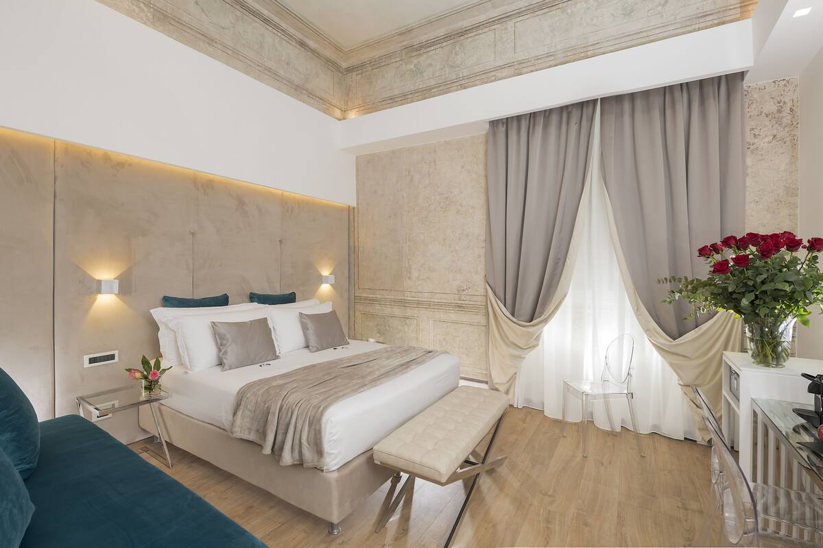 Deluxe Room | Down comforters, memory foam beds, minibar, in-room safe