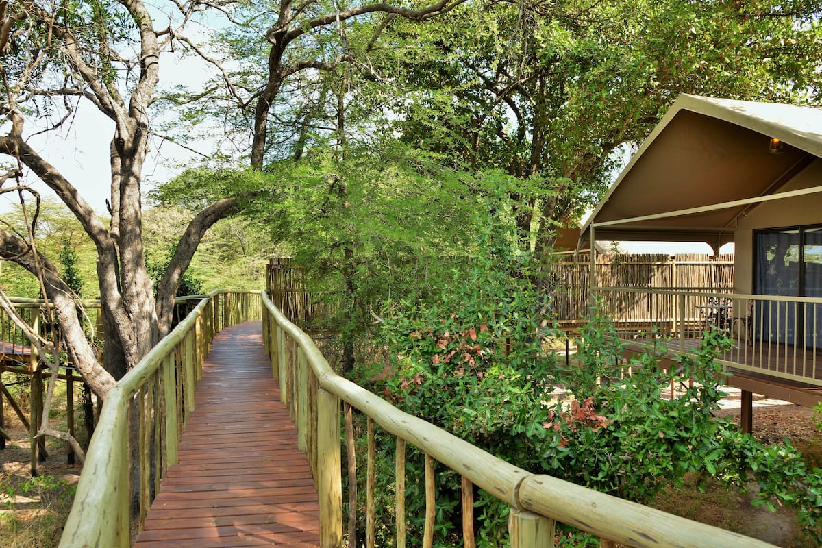 Partial River View Room | 1 bedroom, in-room safe, desk, laptop workspace