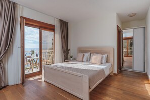 Apartamento família, vista para o mar | 2 quartos, roupas de cama antialérgicas, camas Select Comfort