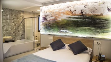 Habitació doble, banyera d'hidromassatge | Escriptori, cortines opaques, bressols gratuïts i wifi gratuïta