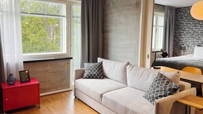 Apartamento City | Zona de estar