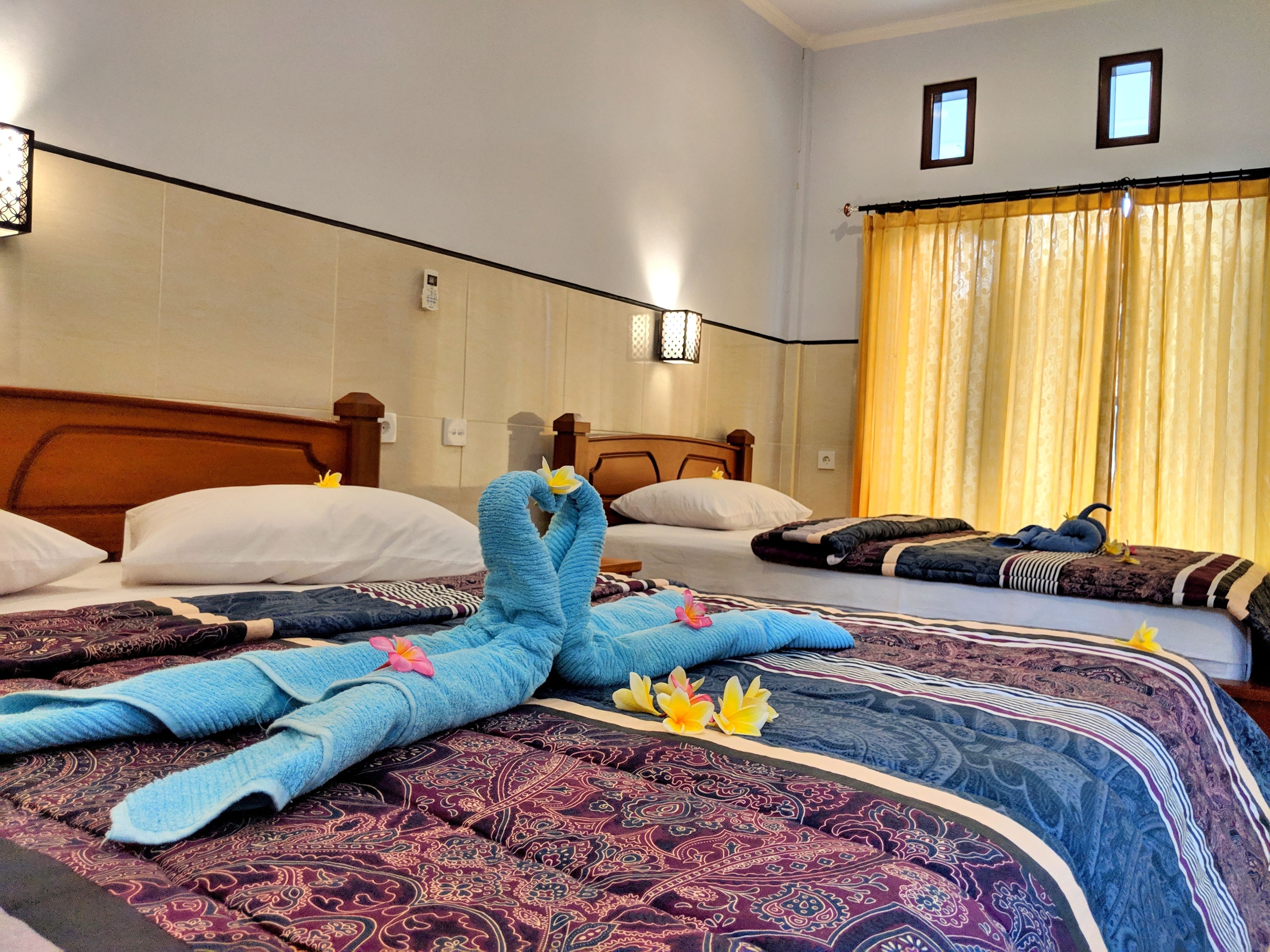 Deluxe Triple Room, Balcony, Pool View | Room amenity