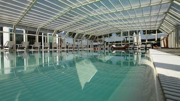 Indoor pool, 2 outdoor pools, open 10:00 AM to 10:00 PM, pool umbrellas