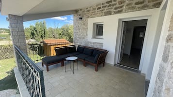 Vila conforto, 4 quartos, vista para a piscina | Terraço/pátio