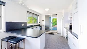 Apartment, 2 Bedrooms, River View | Private kitchen | Microwave, coffee/tea maker, electric kettle, toaster