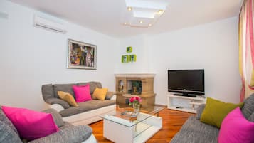 Apartment, 2 Bedrooms | Living area | Flat-screen TV