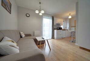Appartement (3F/3) | Woonruimte | Een flatscreentelevisie