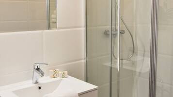 Deep soaking tub, rainfall showerhead, hair dryer, towels