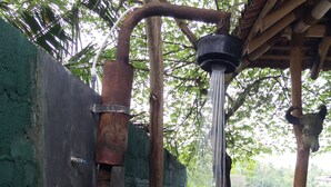A water pump system with a metal structure and a wooden roof. - Mahawewa Nature Resort and SPA (Tangalle)