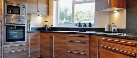 Dishwasher, highchair, cookware/dishes/utensils