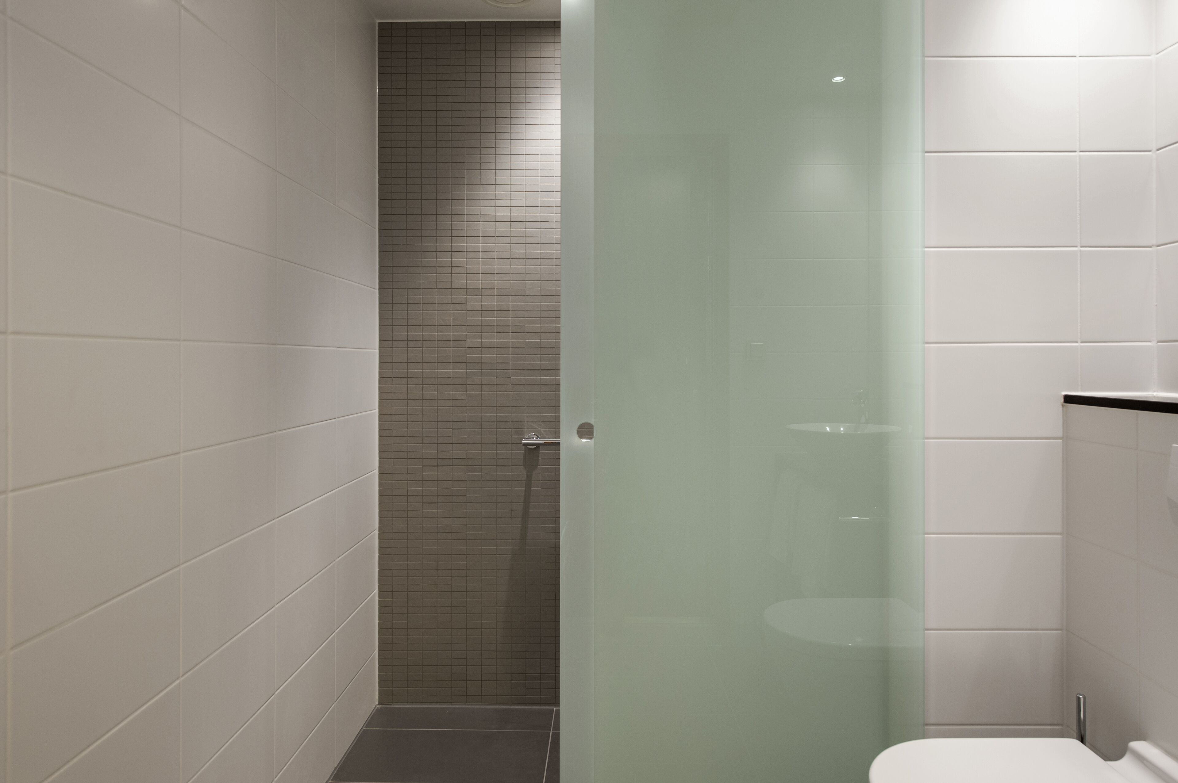stylish studio regular | bathroom | shower, rainfall showerhead, eco-friendly toiletries, hair dryer