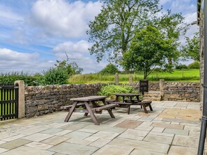 Outdoor dining - An 1800’s barn conversion with beams, exposed stonework and flagged floors. (Horton-in-Craven, near Skipton)