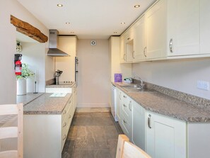 Dishwasher, high chair, freezer - An 1800’s barn conversion with beams, exposed stonework and flagged floors. (Horton-in-Craven, near Skipton)