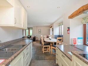 Dishwasher, high chair, freezer - An 1800’s barn conversion with beams, exposed stonework and flagged floors. (Horton-in-Craven, near Skipton)