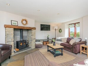 Fireplace - An 1800’s barn conversion with beams, exposed stonework and flagged floors. (Horton-in-Craven, near Skipton)