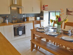 Dishwasher, highchair, cookware/dishes/utensils, freezer - 4 bedroom accommodation in Llanfaelog, near Rhosneigr (Llanfaelog, near Rhosneigr)