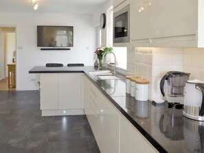 Dishwasher, high chair, cookware/dishes/utensils