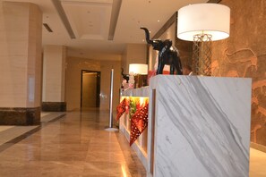 Check-in/check-out kiosk