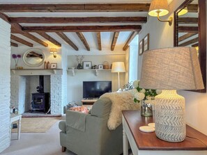 Fireplace - Grain End Cottage is set in large landscaped gardens. (Sawdon, near Scarborough)