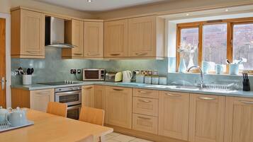 Dishwasher, high chair, cookware/dishes/utensils