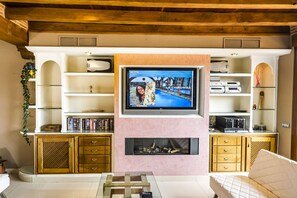 Smart TV, fireplace, DVD player, foosball