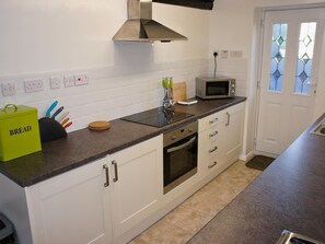 Dishwasher, high chair, cookware/dishes/utensils - 3 bedroom accommodation in Swimbridge, near Barnstaple (Swimbridge, near Barnstaple)