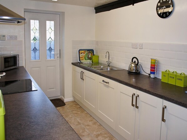 Dishwasher, high chair, cookware/dishes/utensils