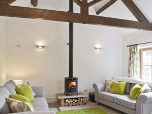Fireplace - Relax in front of the woodburner in this single-storey barn conversion. (Culmington, near Ludlow)