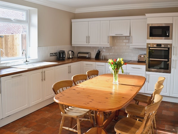 Dishwasher, high chair, cookware/dishes/utensils