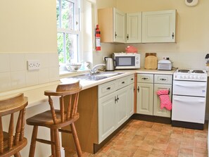 High chair, cookware/dishes/utensils - 1 bedroom accommodation in Kirkoswald, near Penrith (Kirkoswald, near Penrith)
