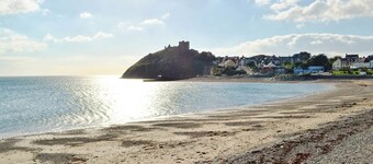 A spacious detached property with an open fire and enclosed garden.