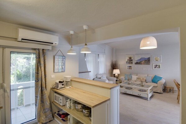 Villa, 3 Bedrooms | Living area | 24-inch flat-screen TV with digital channels, TV, fireplace - Ekatis House I by Halkidiki Villas (Kassandra)