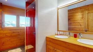 Bathtub, hair dryer, shampoo