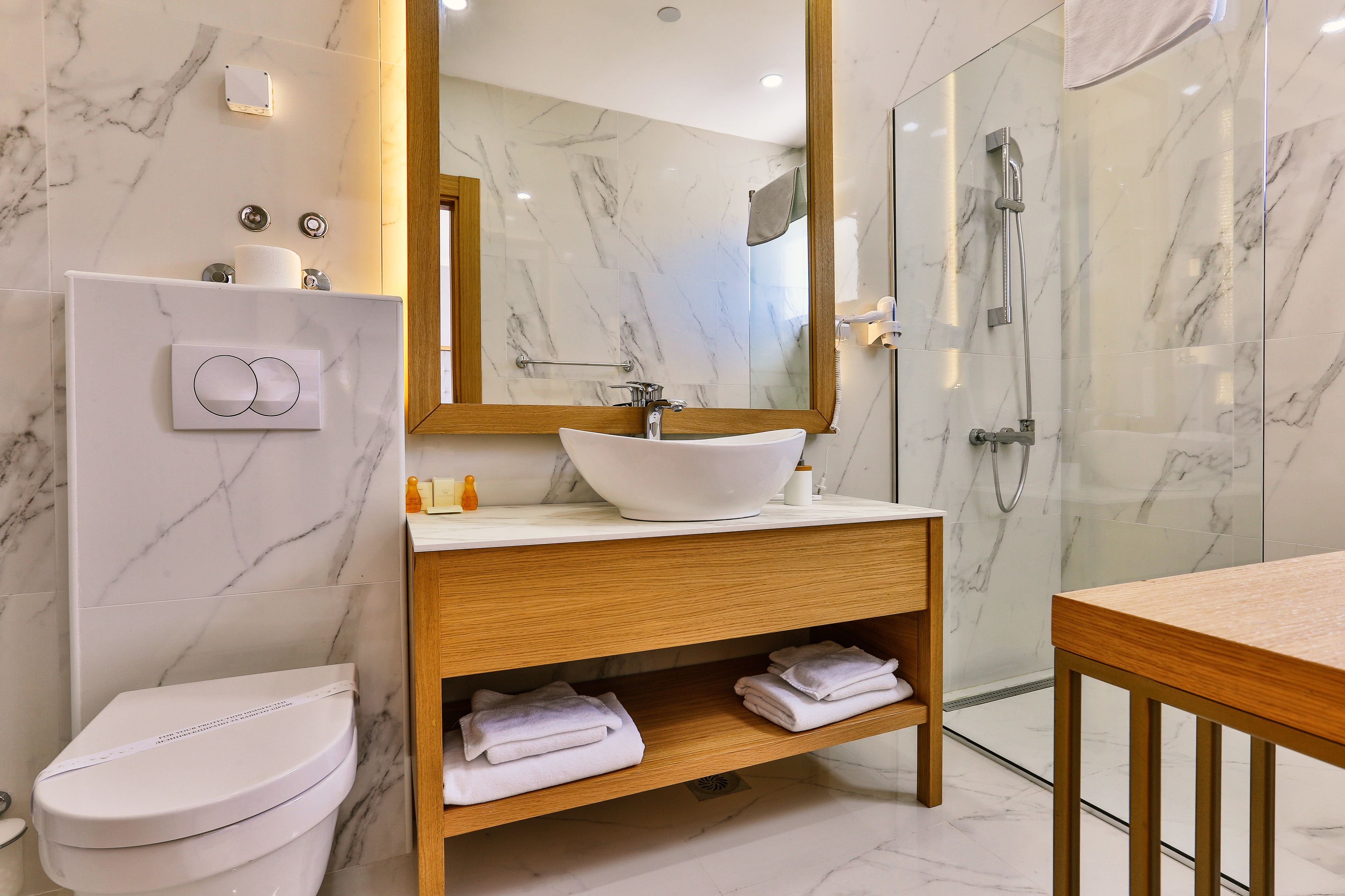 superior double room | bathroom | shower, free toiletries, hair dryer, slippers