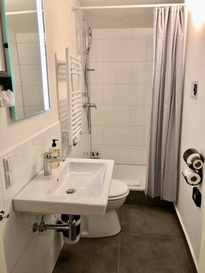 Shower, free toiletries, hair dryer, towels