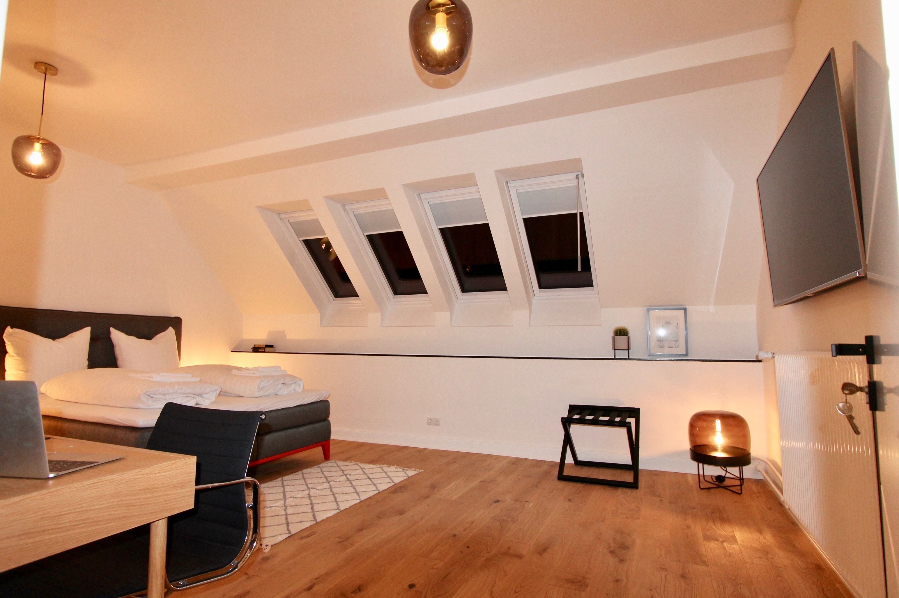 Premium bedding, down duvets, desk, blackout curtains