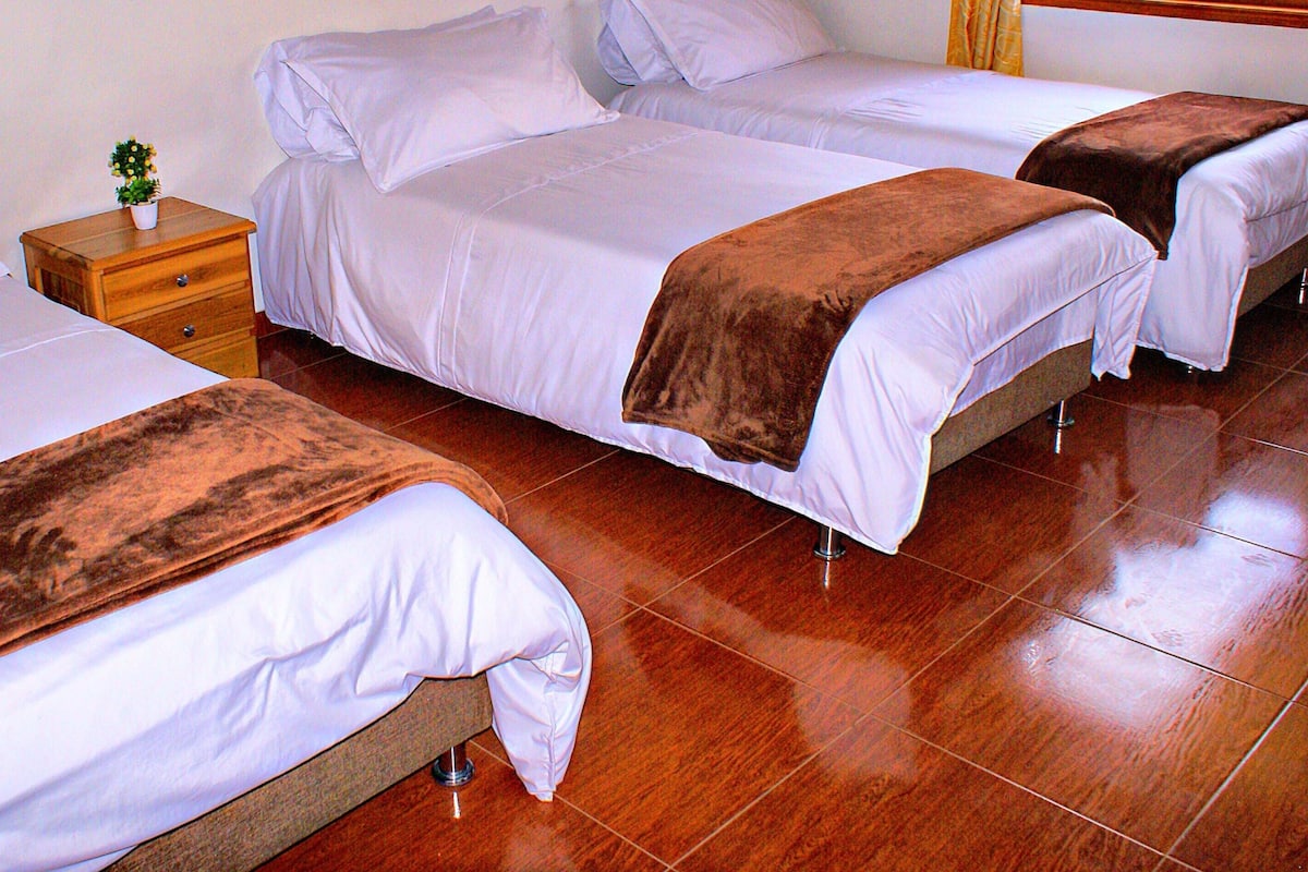 Comfort Quadruple Room, 1 Bedroom, Non Smoking | Blackout drapes, iron/ironing board, free WiFi, bed sheets