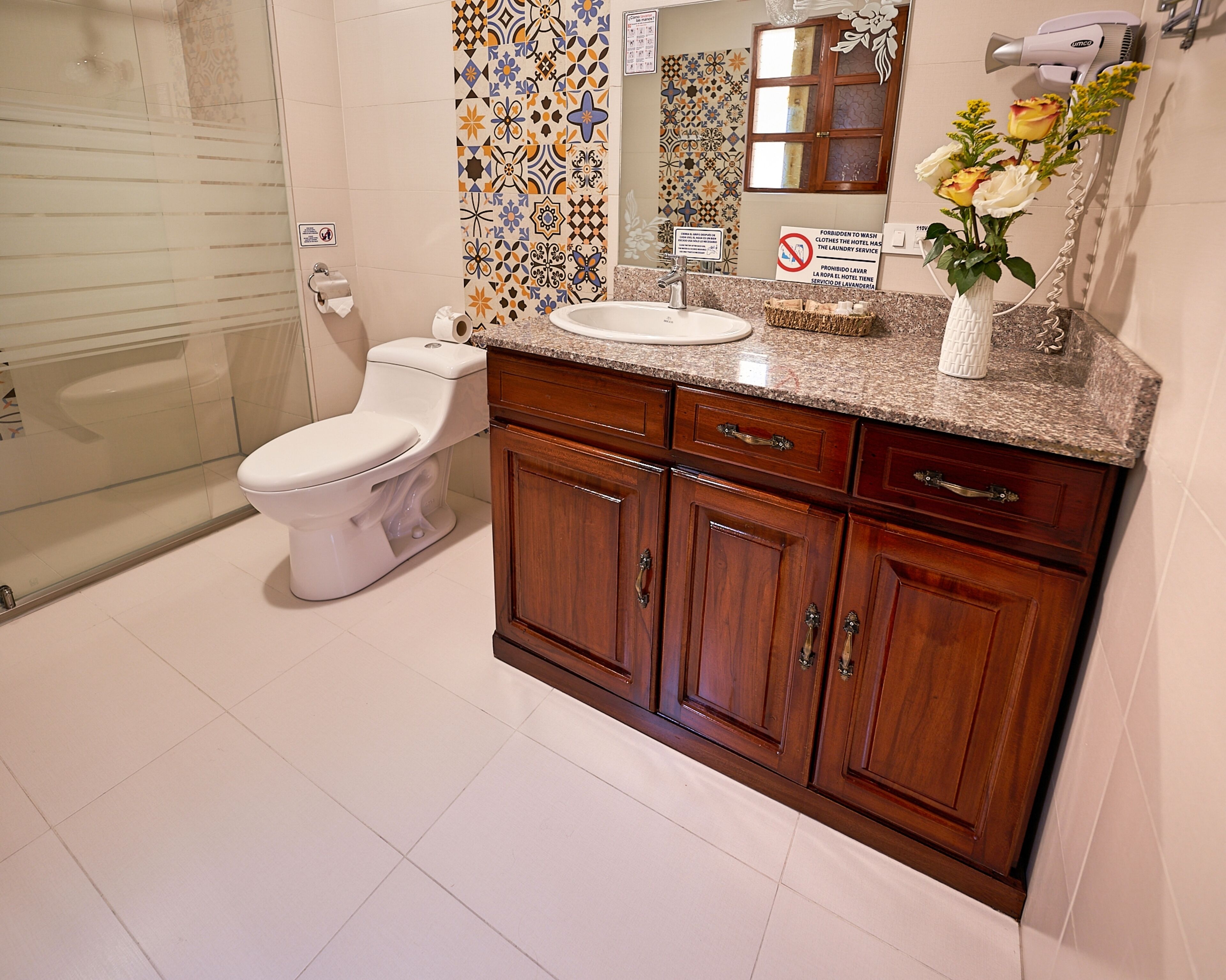 rainfall showerhead, free toiletries, hair dryer, heated floors