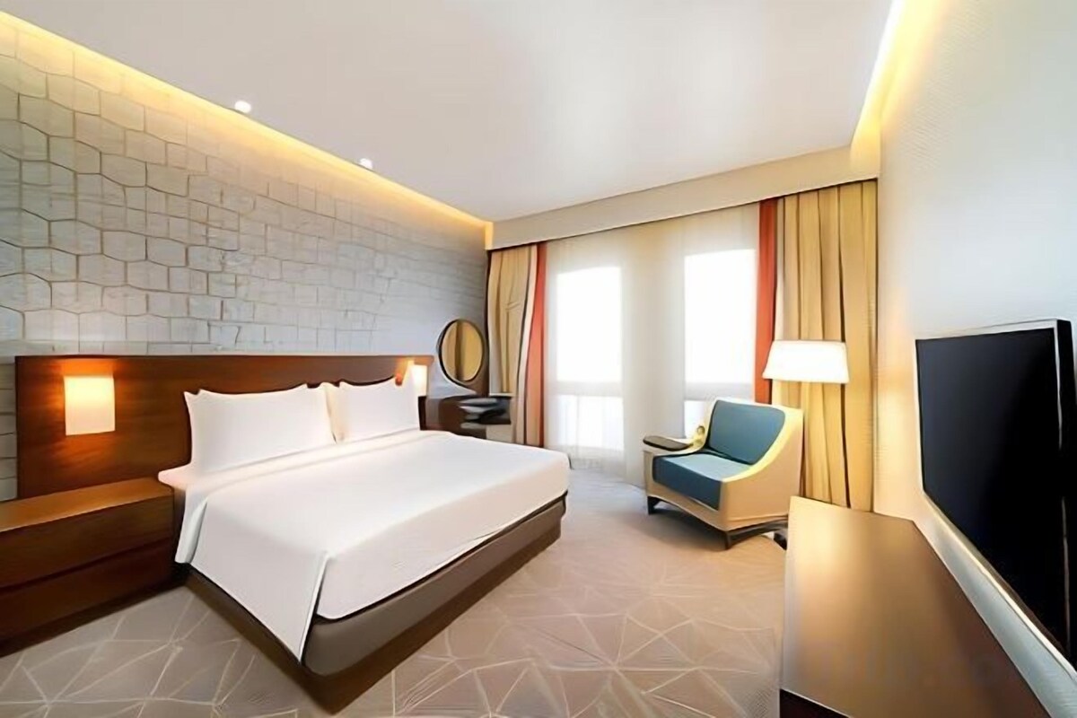 Luxe beddengoed, pillowtop-bedden, een minibar, een kluis op de kamer