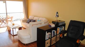 Apartment, 2 Bedrooms, Balcony, Ocean View | Living area | Flat-screen TV