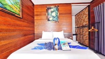 Quarto luxo, 1 quarto | Frigobar, Wi-Fi de cortesia