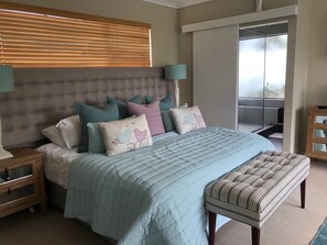 Edredón, camas con pillow-top, minibar y decoración personalizada 