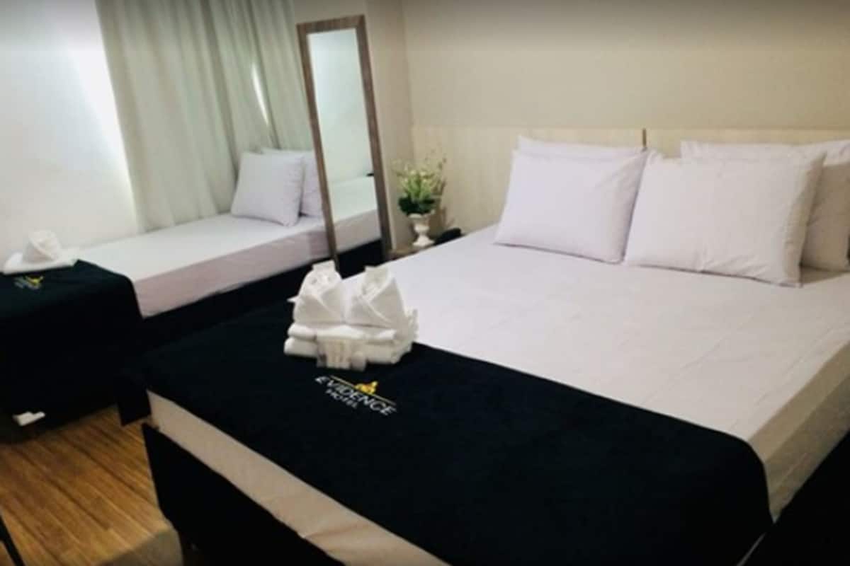 Triple Room | Minibar, individually furnished, desk, blackout drapes